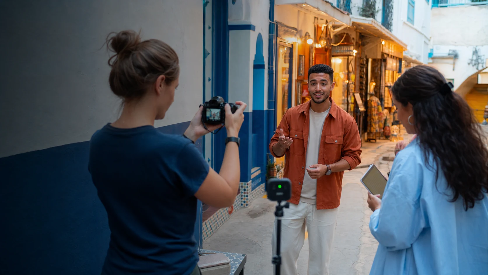 Brand and creator teams producing a live campaign in a modern studio